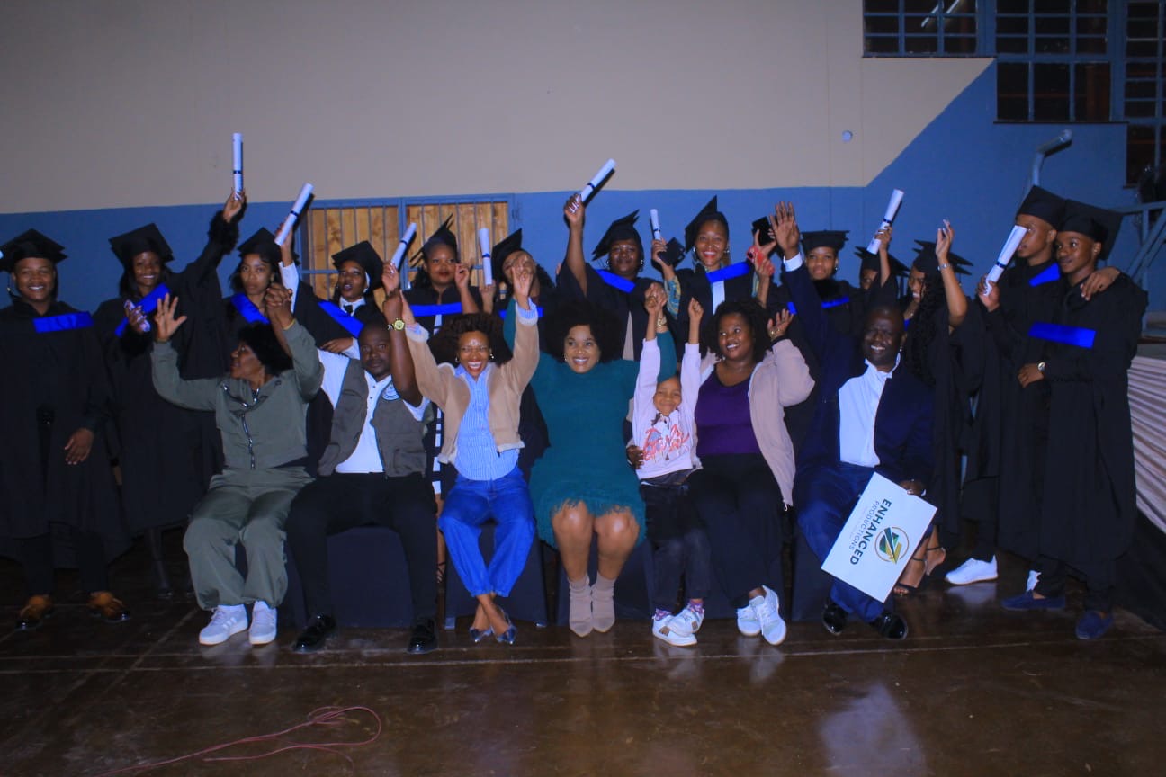 Enhanced Productions graduates celebrating together after completing their training